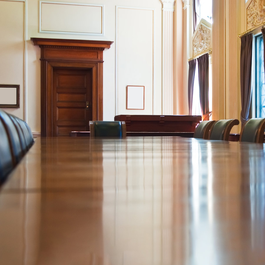 Formal boardroom prepared for a high-level policy meeting